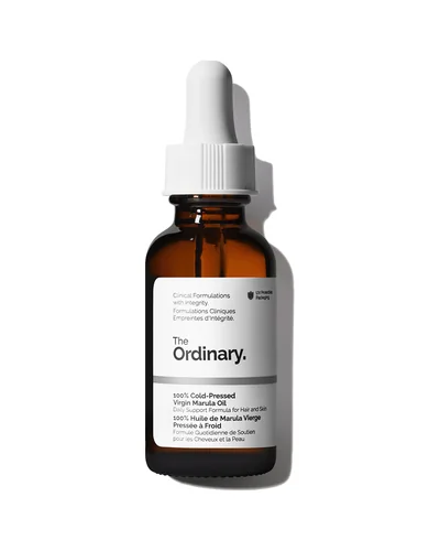 Envase de 100% Cold-Pressed Virgin Marula Oil sobre fondo blanco