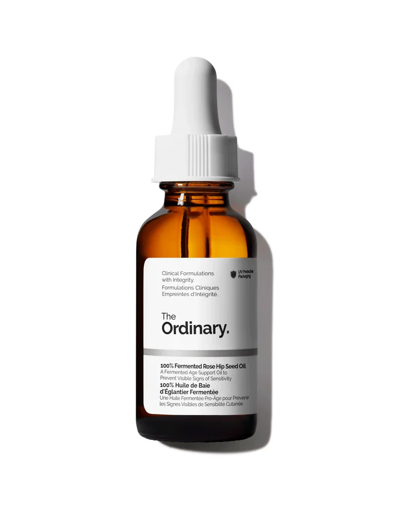 Envase de 100% Fermented Rose Hip Seed Oil sobre fondo blanco