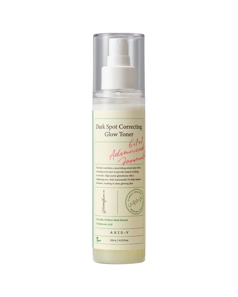 Frasco con pulverizador de Dark Spot Correcting Glow Toner sobre fondo blanco