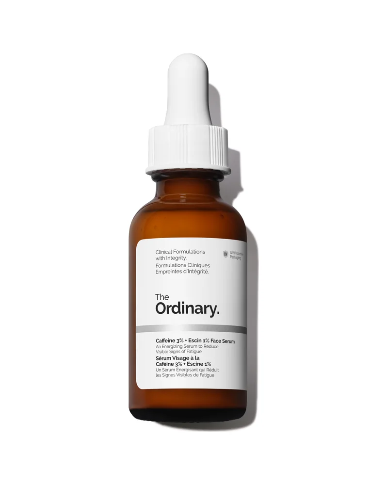 Envase de Caffeine 3% + Escin 1% Face Serum sobre fondo blanco