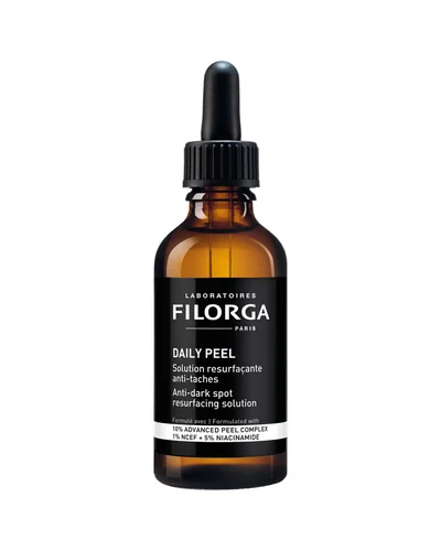 Envase de Daily Peel Dark Spots sobre fondo blanco