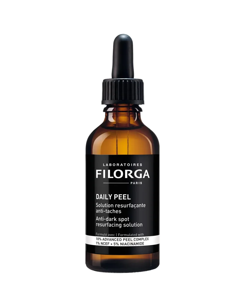 Envase de Daily Peel Dark Spots sobre fondo blanco