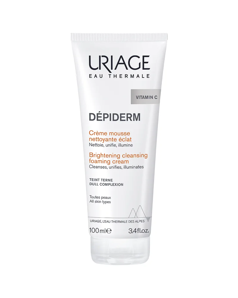 Envase de Dépiderm Espuma Limpiadora Iluminadora sobre fondo blanco
