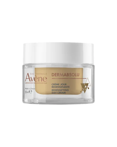 Envase de DermAbsolu Crema de día sobre fondo blanco