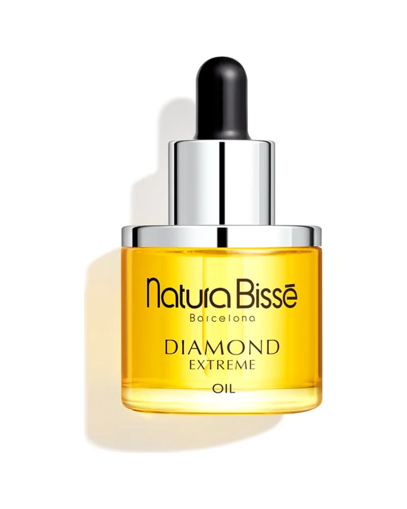 Envase de Diamond Extreme Oil sobre fondo blanco