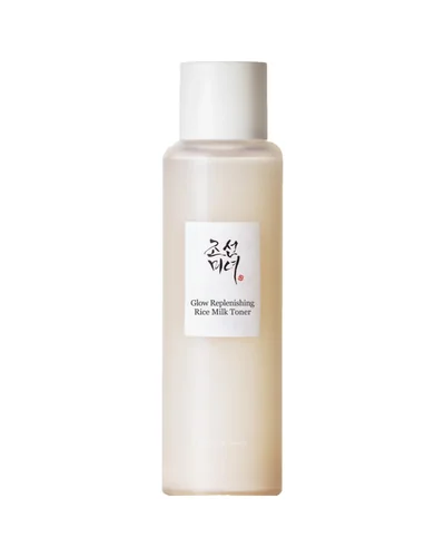 Envase de Glow Replenishing Rice Milk sobre fondo blanco