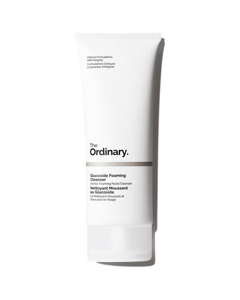 Envase de Glucoside Foaming Cleanser sobre fondo blanco
