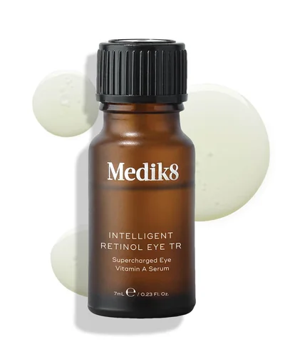 Envase de Intelligent Retinol Eye TR sobre fondo blanco, con una muestra de la textura al lado