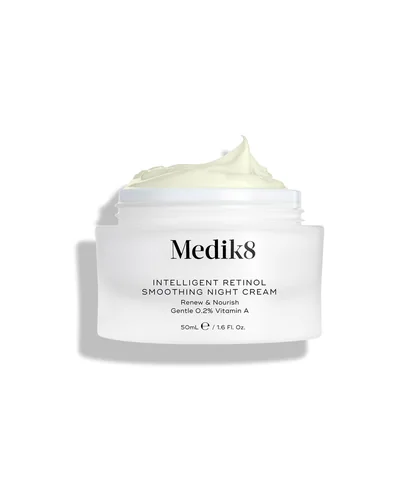 Envase de Intelligent Retinol Smoothing Night Cream sobre fondo blanco, abierto