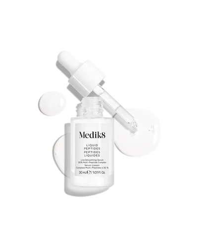 Envase de Liquid Peptides sobre fondo blanco, con una muestra de la textura al lado