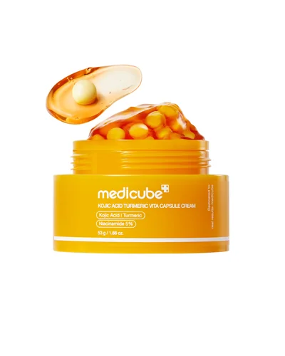 Tarro de Kojic Acid Turmeric Vita Capsule Cream sobre fondo blanco