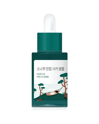 Envase de Pine Calming Cica Ampoule sobre fondo blanco