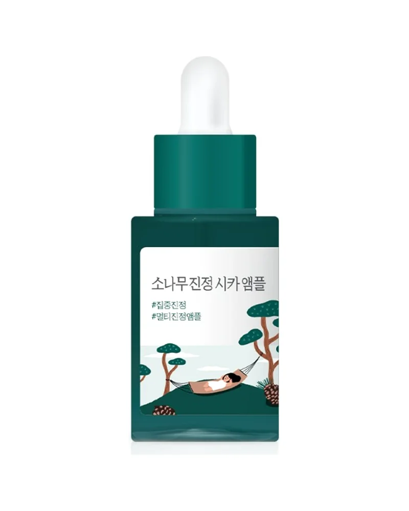 Envase de Pine Calming Cica Ampoule sobre fondo blanco