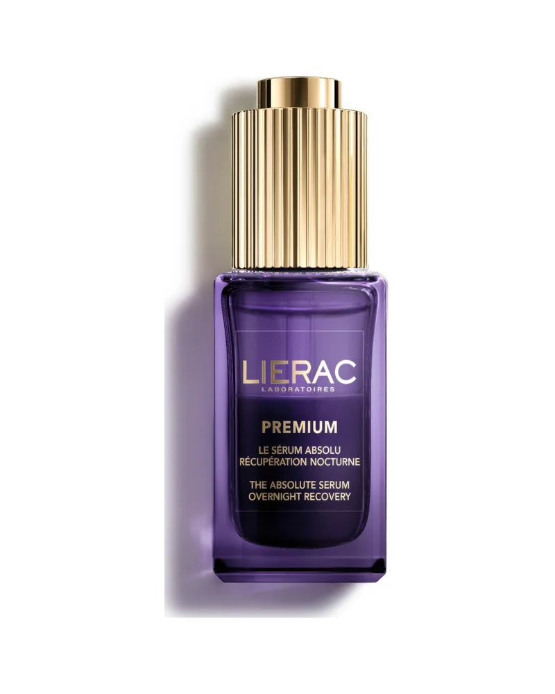 Frasco de Premium El Sérum Absoluto Regeneración Nocturna sobre fondo blanco