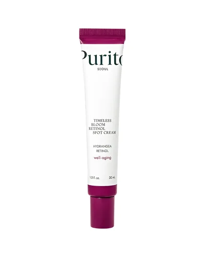 Envase de Timeless Bloom Retinol Spot Cream sobre fondo blanco