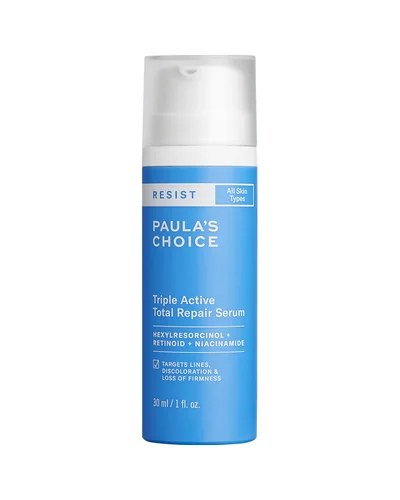Envase de Resist Sérum Triple Acción Reparador Total sobre fondo blanco