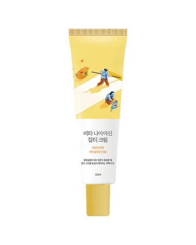 Envase de Vita Niacinamide Dark Spot Cream sobre fondo blanco