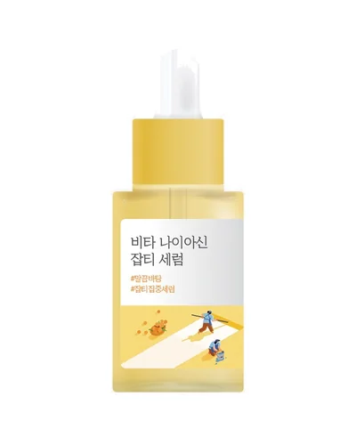 Envase de Vita Niacinamide Dark Spot Serum sobre fondo blanco
