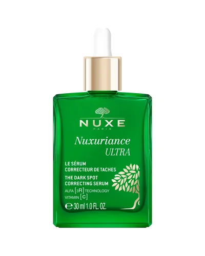 Envase de Sérum Corrector de Manchas sobre fondo blanco