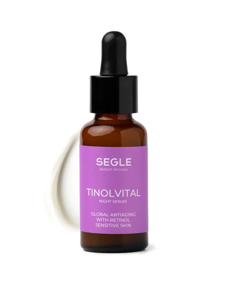 Envase de Sérum Tinolvital sobre fondo blanco