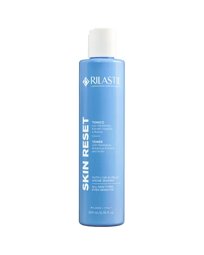 Botella de Skin Reset Tónico sobre fondo blanco