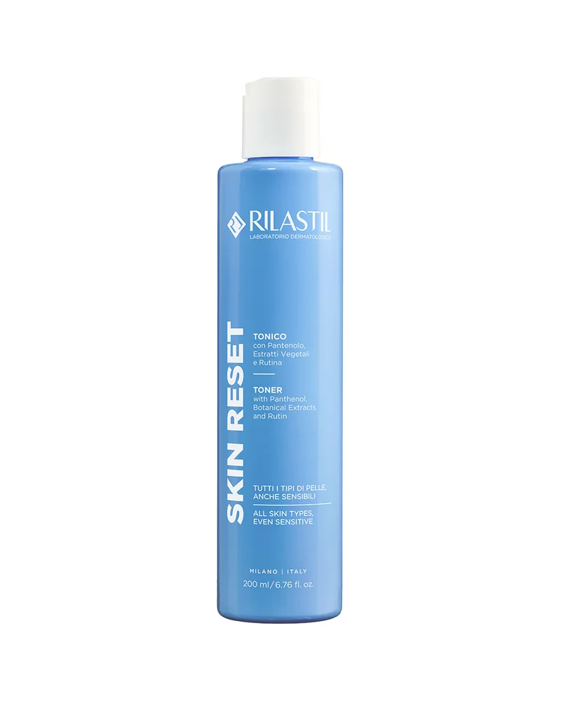Botella de Skin Reset Tónico sobre fondo blanco