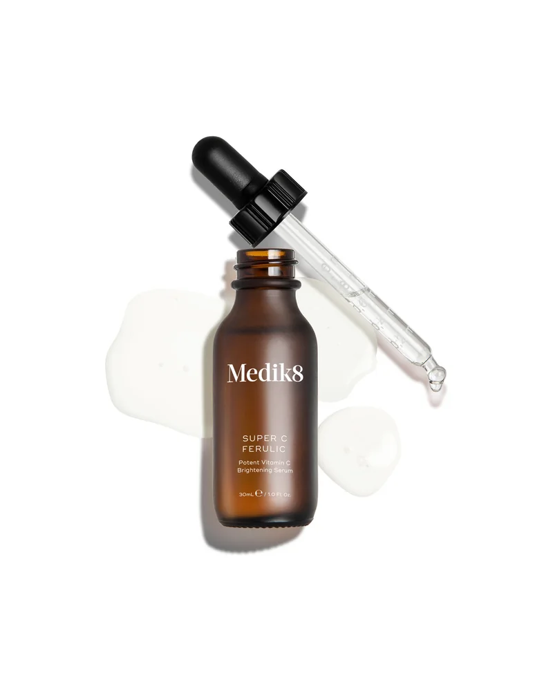 Envase de Super C Ferulic sobre fondo blanco, con una muestra de la textura al lado