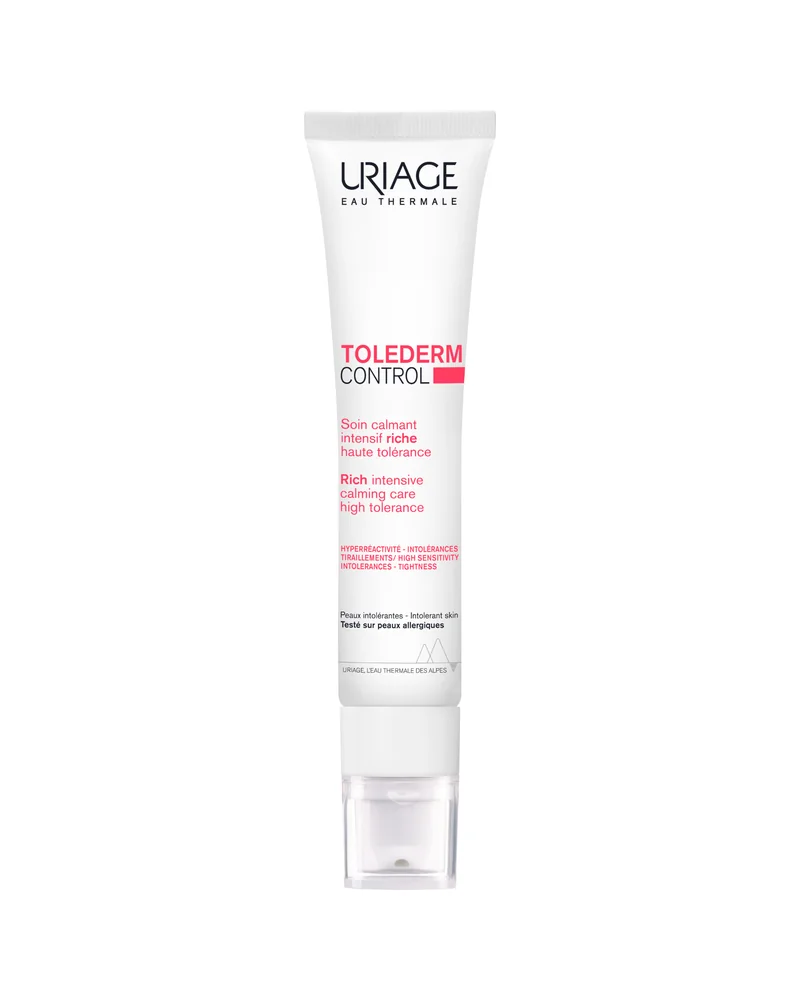 Envase de Toléderm Control Crema Rica sobre fondo blanco