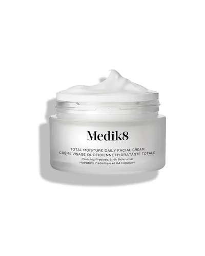 Envase de Total Moisture Daily Facial Cream sobre fondo blanco, abierto