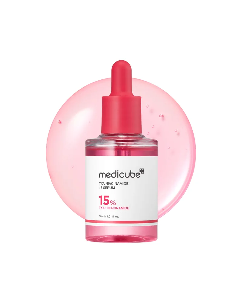 Frasco con cuentagotas de TXA Niacinamide Serum sobre un círculo de gel rosa