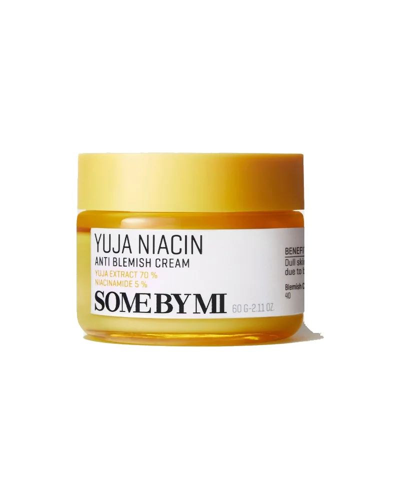 Envase de Yuja Niacin Anti-Blemish Cream sobre fondo blanco
