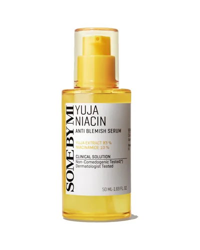 Envase de Yuja Niacin Anti-Blemish Serum sobre fondo blanco